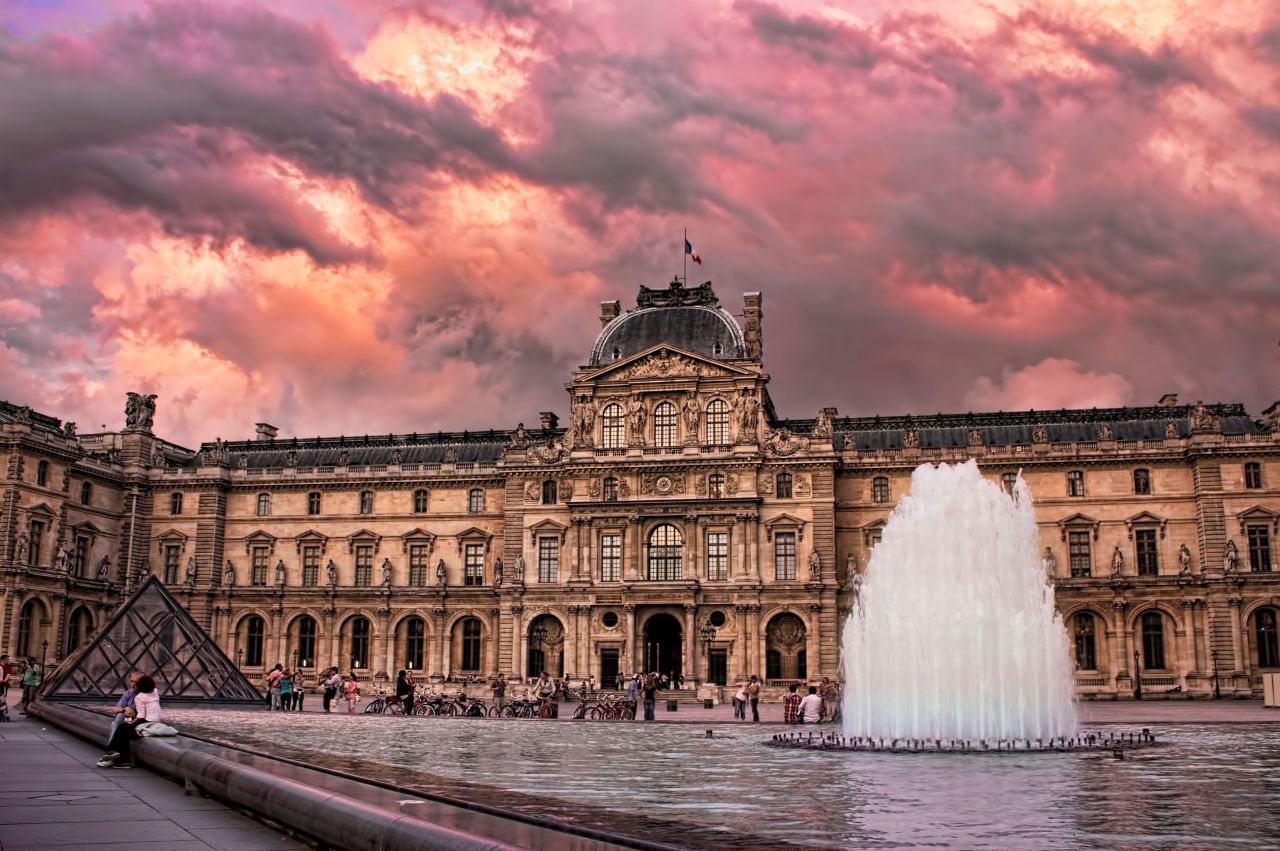 Let's explore all of Paris' glittering allure. "During a visit to Paris for work, I took this image from the Louvre courtyard at sunset just before a storm moved in from the east," iReporter Frank Childress said. Click through the gallery for more snapshots of Paris: