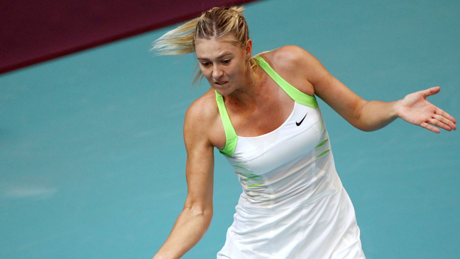 Maria Sharapova plays a return during her straight sets defeat to Angelique Kerber in Paris. 