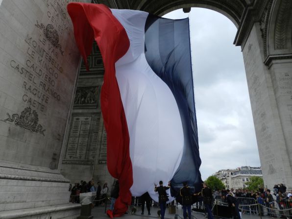 Carolyn Breathed snapped this shot of the French military raising the flag the day before Bastille Day. "It was really thrilling to finally see the French flag flying proudly under the Arc de Triomphe."