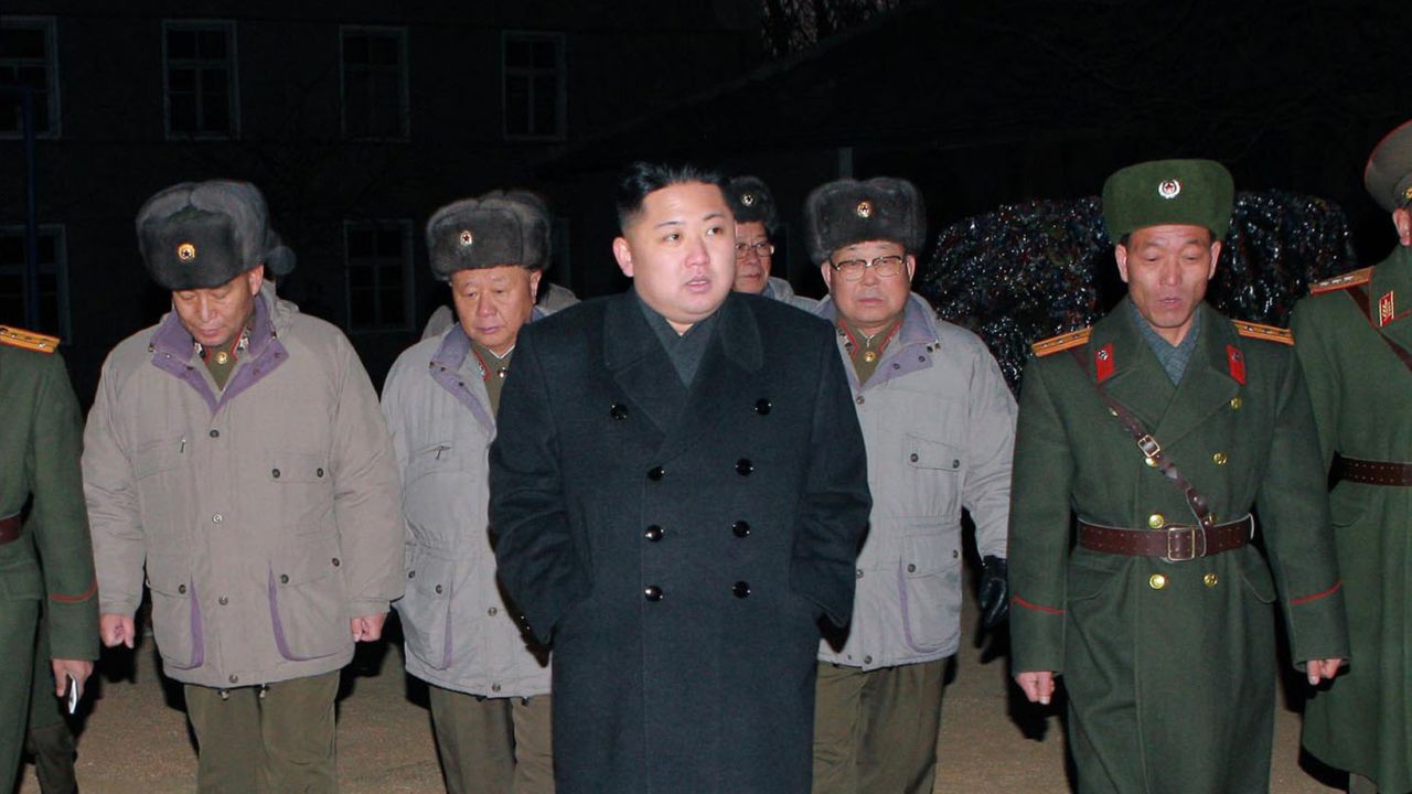 A photo released by North Korea's official news agency on Thursday shows North Korean leader Kim Jong Un, center. 