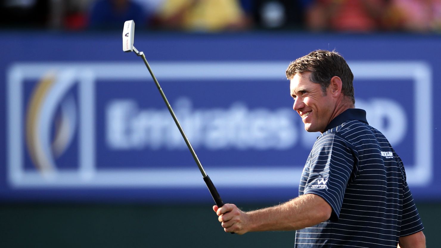 Lee Westwood has much to smile about after grabbing the lead at the Dubai Desert Classic on Saturday