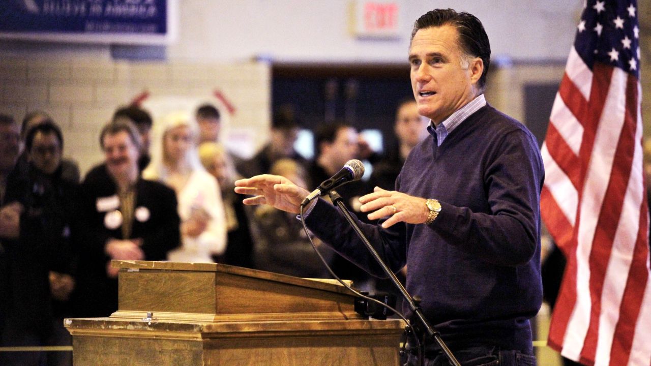 Mitt Romney addresses voters last week at a caucus site in York County, Maine.