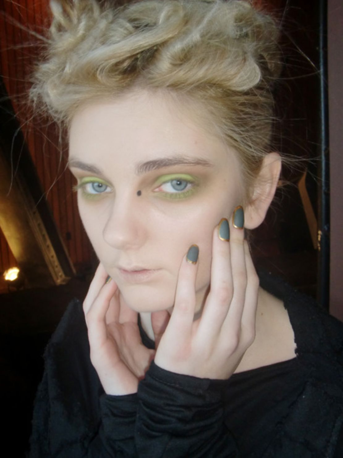 Nail artist Fleury Rose creates a mossy, gold rimmed design for Katie Gallagher's Fashion Week show.