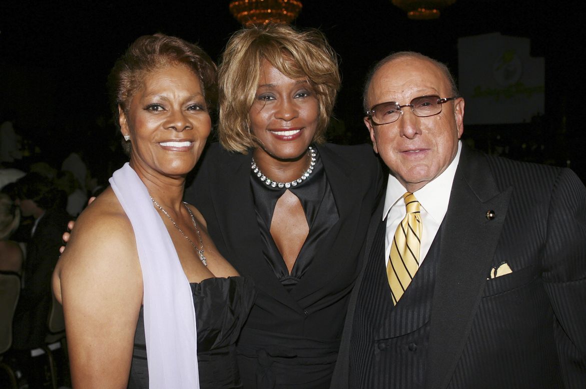 Houston poses with her cousin Dionne Warwick and producer Clive Davis during the 15th annual Ella Awards in September 2006. 
