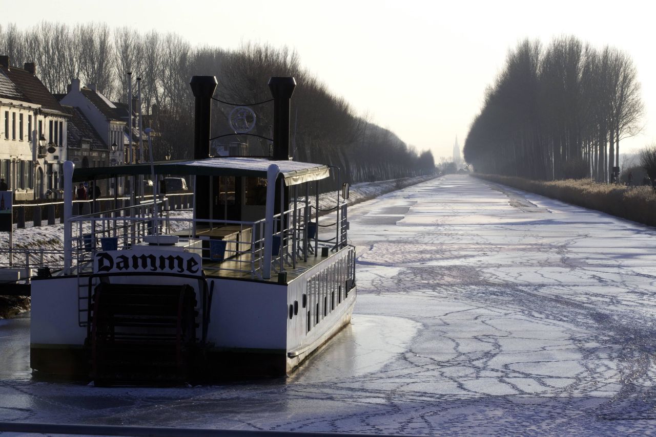 A picture taken on February 11, 2012 shows the frozen Damse Vaart in Damme. For the 13th consecutive day, temperatures in Belgium were below zero degrees Celsius. This is the longest cold wave for Belgium since 1941. 
