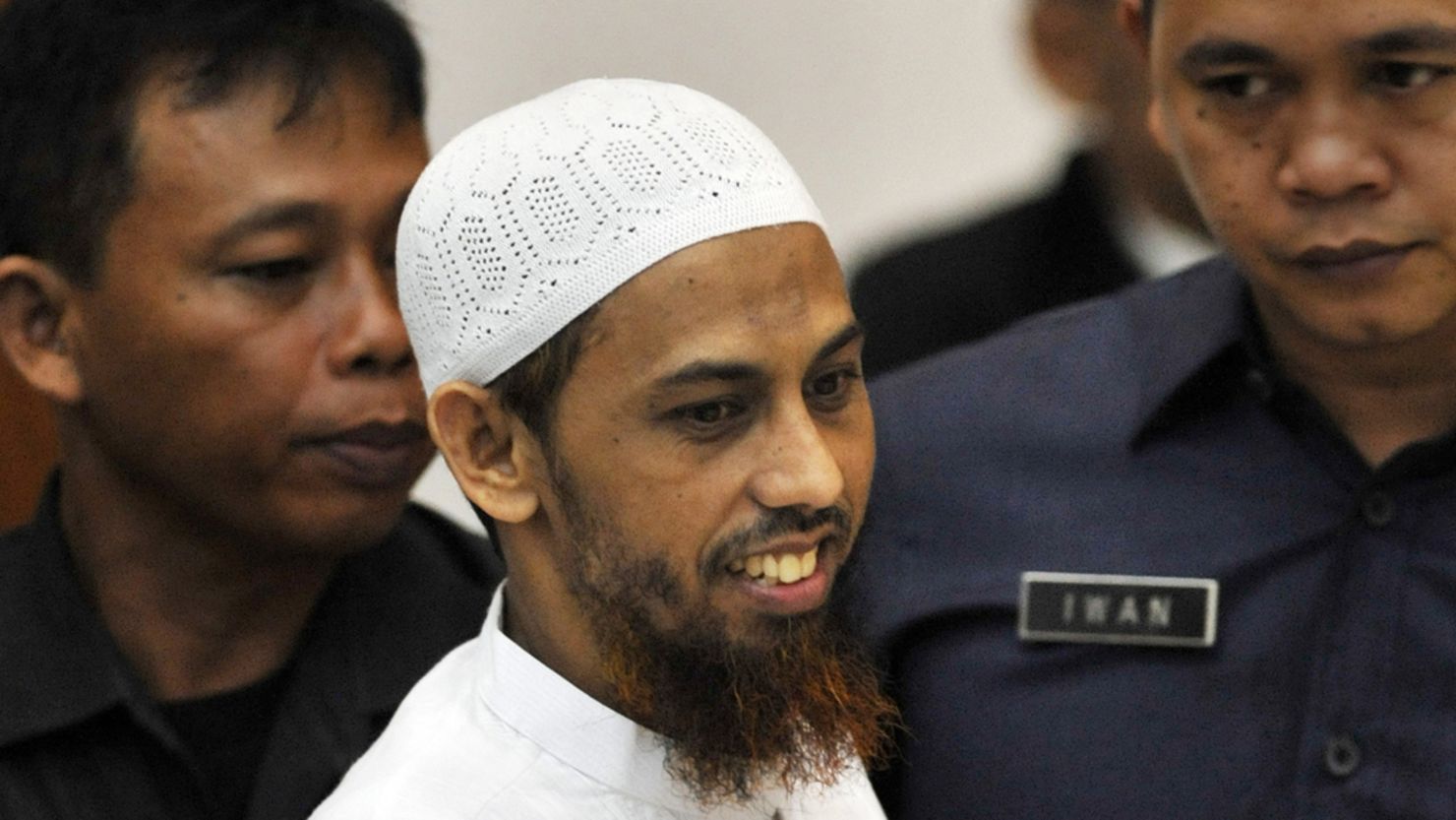 Umar Patek arrives at court in Jakarta to face trial for his alleged involvement in the 2002 Bali bombings.  