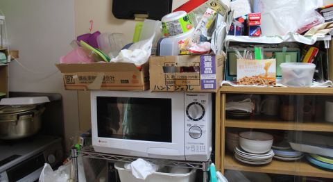 Many survivors await news of permanent housing. Mitsuyuki Wakamatsu, 65, says the cramped kitchen in his temporary shelter is a toy kitchen. "you can't really do anything in here," he said.