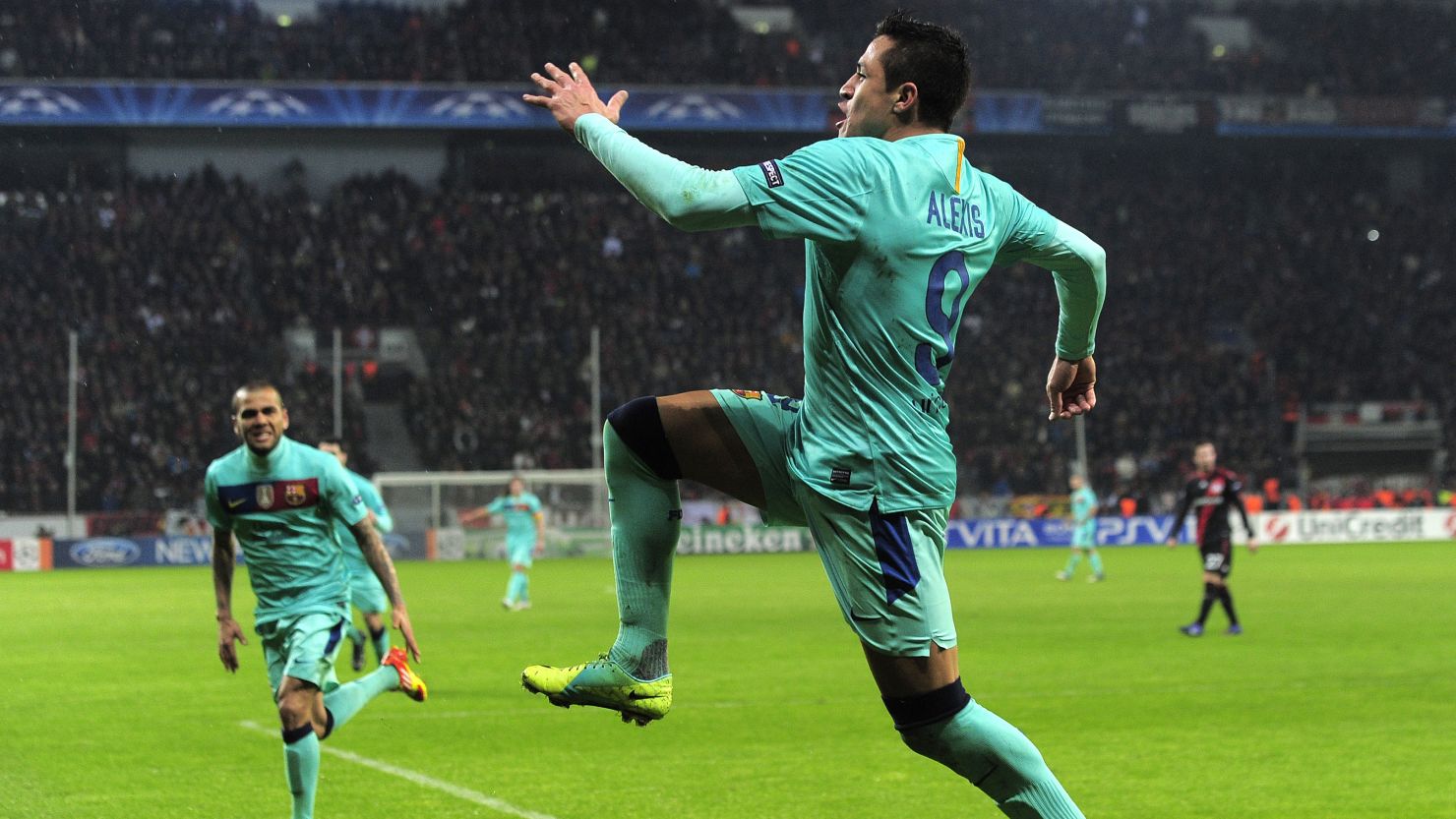 Barcelona's Alexis Sanchez celebrates after scoring during the Champions League last 16 tie against Bayer Leverkusen.