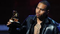 Singer Chris Brown speaks after receiving his Grammy award at the Staples Center during the 54th Grammy Awards in Los Angeles, California, February 12, 2012. AFP PHOTO Robyn BECK (Photo credit should read ROBYN BECK/AFP/Getty Images)