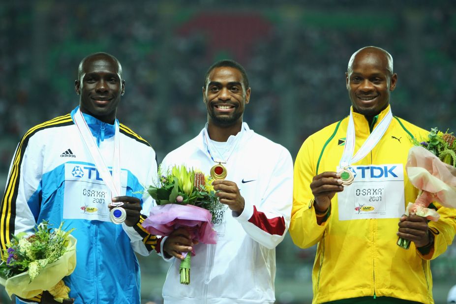 Gay on the podium collecting the gold medal for winning the 100m at the 2007 World Athletics Championships in Osaka, Japan. He also won the 200m from Bolt and picked up another title in the 4x100m relay.