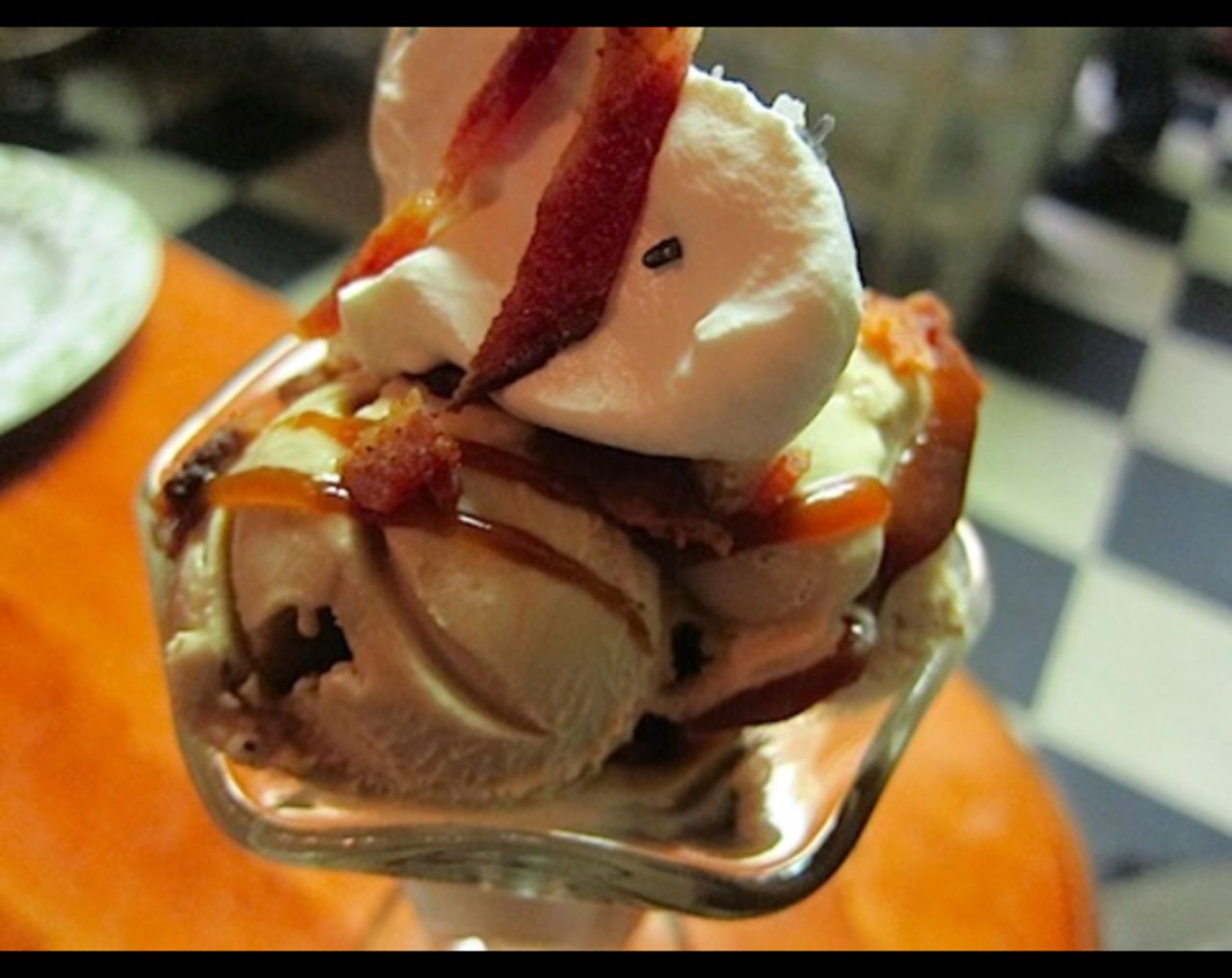 "This is what I ate in lieu of a cake for my 35th birthday dinner, and it was one of the greatest desserts I've ever eaten -- and I'm a sweetsaholic," said Lynn Chen of Los Angeles. It's a sundae topped with bacon caramel sauce and Applewood bacon. 