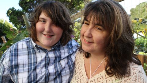 Cory, 15, seen here with his mother, Nicole Seguin, credits his family for supporting him. 