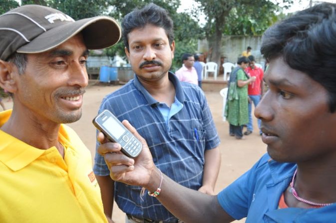 A man is interviewed via mobile phone for a report on CGNet Swara.