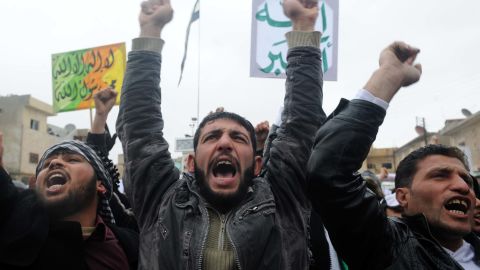 Syrians demonstrate against the regime after Friday prayers in the north Syrian city of Idlib on February 17. Activists working against the regime now have to worry about malware that can expose their activities.