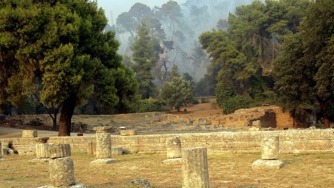 Ancient Olympia in Greece, pictured here in 2007 during a spate of brush fires, is the site of the original Olympic Games.