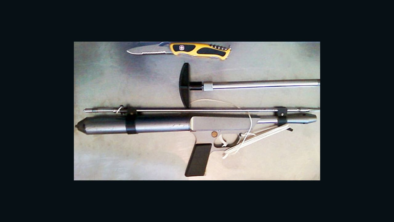 TSA released a picture of a spear gun and utility knife that a traveler tried to take on board an airplane.
