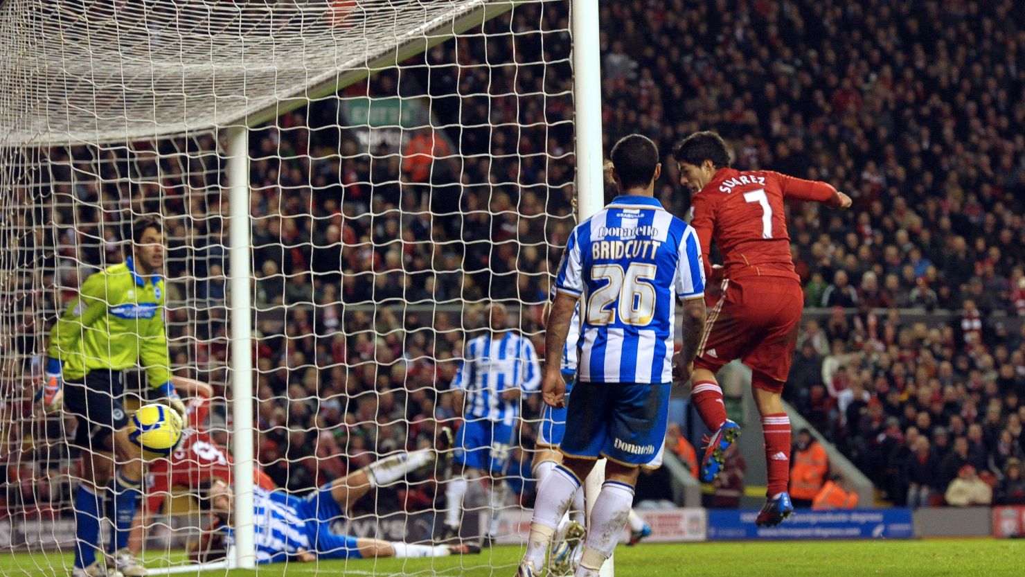 Luis Suarez scores for Liverpool as they thrashed second-tier Brighton 6-1 in the FA Cup.