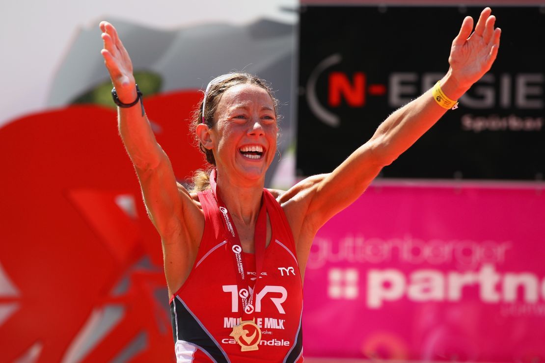 Chrissie Wellington celebrates winning the Challenge Roth Triathlon with a new long distance world record in 2011.