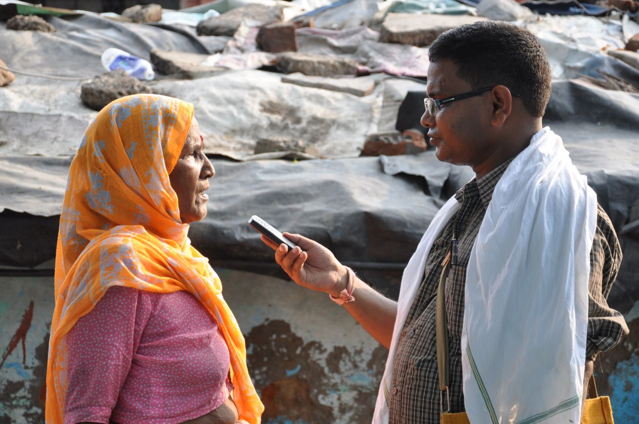 A woman is interviewed by a citizen journalist for for CGNet Swara, a voice portal that allows rural Indians to dial-in via their mobile phones and listen to local news reports for areas where there is often little media coverage.