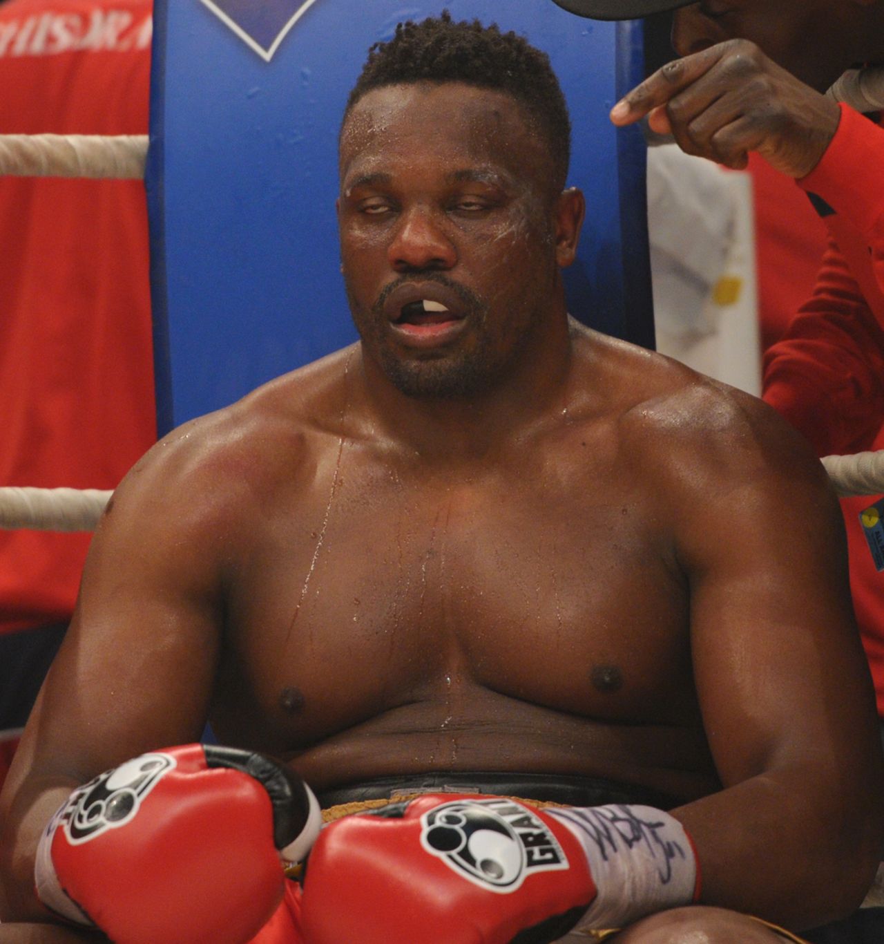Chisora sits in his corner during his fight against WBC heavyweight champion Vitali Klitschko in the Olympic hall in Munich.