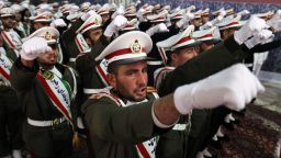 Iranian soldiers chant anti-Israeli and anti-US slogans in Tehran on February 1, 2012. 