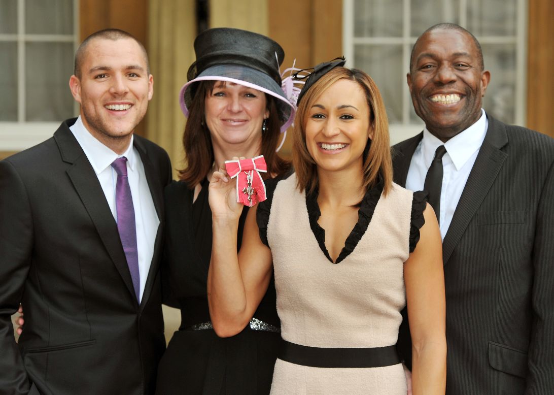 Ennis with her fiancee Andy Hill (left) and parents Alison and Vinny at Buckingham Palace, London in November 2011. 