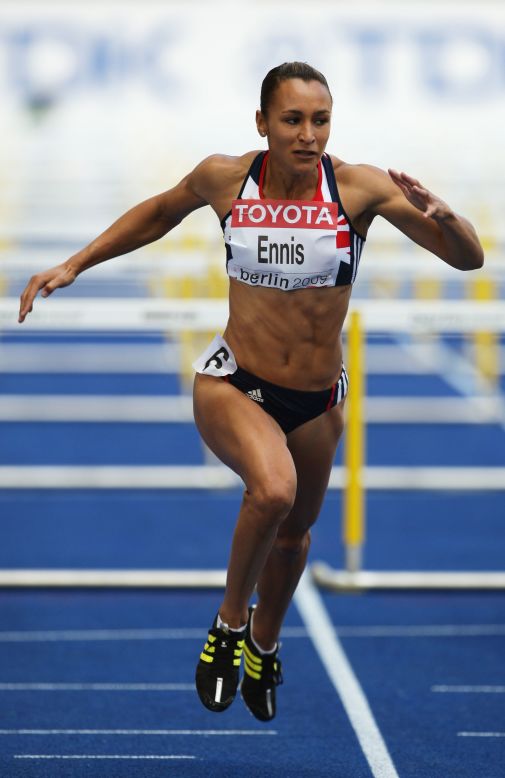 Ennis crosses the line in the 100-meter hurdles on the first day of her successful bid for the gold medal at the 2009 IAAF World Championships in Berlin.  