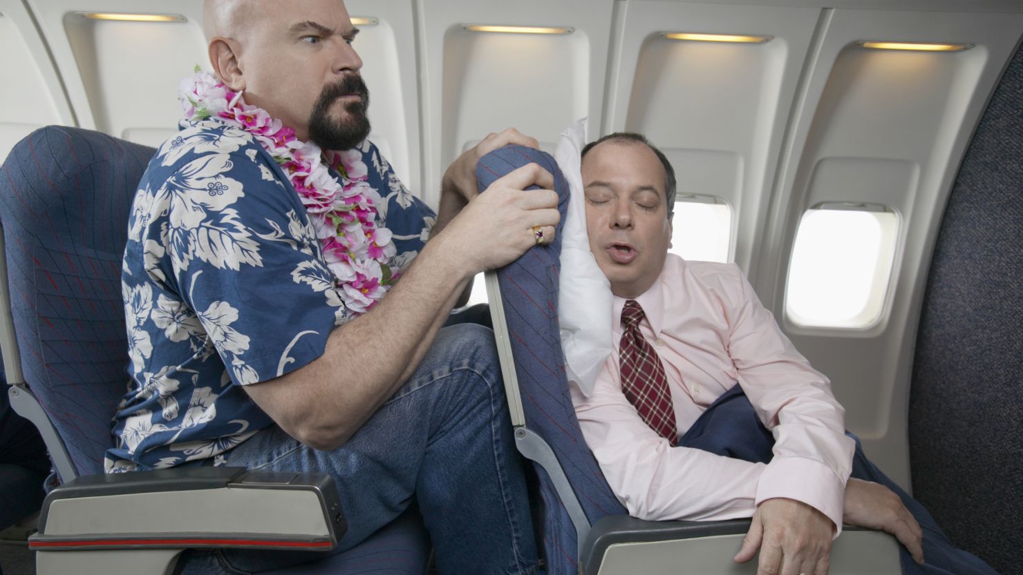 Reclining without regard for fellow passengers creates in-flight tension.