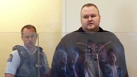 Megaupload founder Kim Dotcom, right, attends court in Auckland, New Zealand, on January 25.