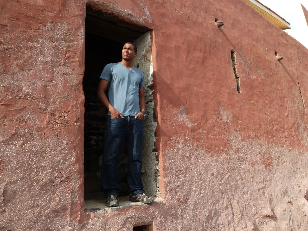 Inside Africa's Errol Barnett looking out through the 'door-of-no-return'. 