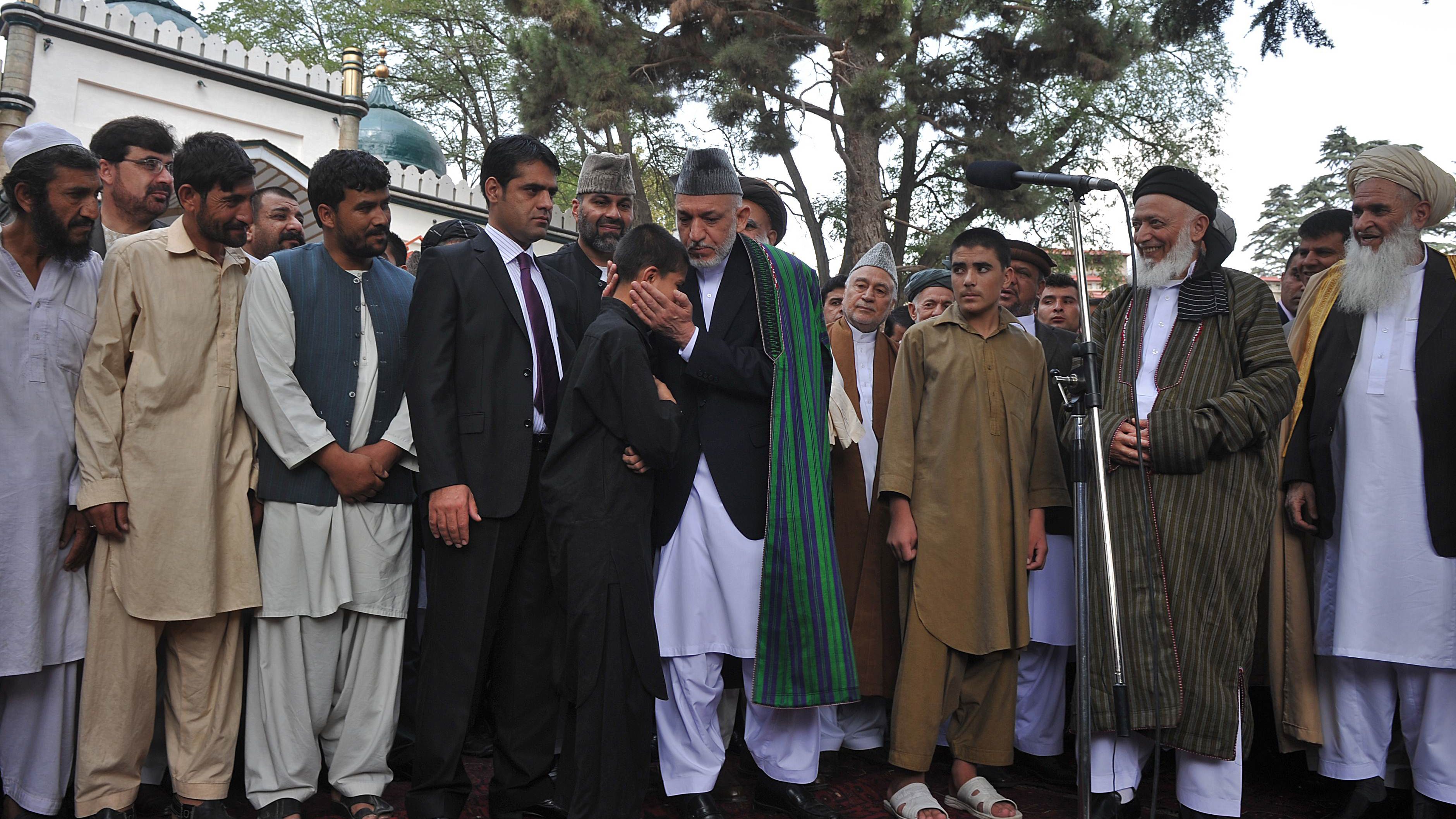 Afghanistan's President Hamid Karzai pardons a would-be child suicide bomber on August 30, 2011.
