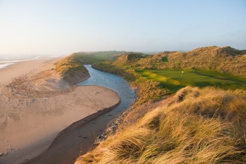 The 3rd hole of the championship course is cut hard against the Aberdeenshire coastline.