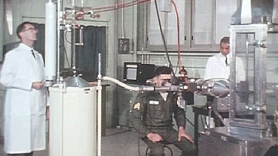 A soldier volunteer and researchers conduct a test in 1963 at the Army's Edgewood Chemical Biological Center. 