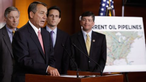 House Speaker John Boehner, at the podium, speaks in support of the Keystone XL crude oil pipeline.