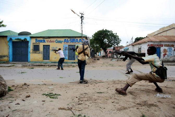 Hard-line Islamist fighters exchange gun fire with Somalian military forces in Mogadishu in the summer of 2009. Somalia has been without any functioning government since 1991 -- perfect territory for different militia and factions to fight over the bones of the old state.