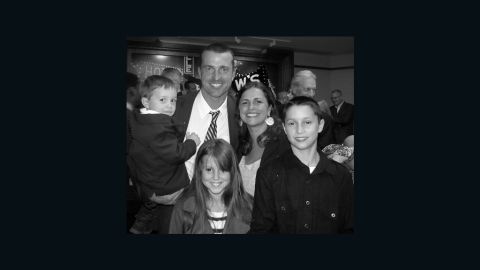 Herren is shown with his wife of 14 years, Heather, and their three children.