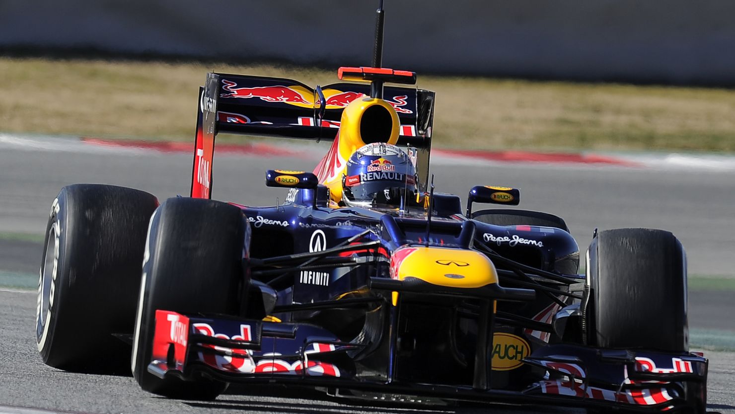 Red Bull's two-time world champion took the team's new RB8 for a test drive in Barcelona on Thursday.