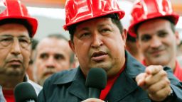 	Handout picture released by the Venezuelan presidency press office showing Venezuelan President Hugo Chavez (R) during an inspection at the Santa Ines agroindustrial complex, in Barinas, on February 21, 2012. Venezuelan President Hugo Chavez announced on Tuesday that in the coming days should be operated to remove a "lesion" in the same place where he was removed a cancerous tumor that was detected in 2011 during some tests in Cuba, but denied to have metastases. AFP PHOTO/PRESIDENCIA RESTRICTED TO EDITORIAL USE - MANDATORY CREDIT "AFP PHOTO/PRESIDENCIA" - NO MARKETING NO ADVERTISING CAMPAIGNS - DISTRIBUTED AS A SERVICE TO CLIENTS (Photo credit should read PRESIDENCIA/AFP/Getty Images)