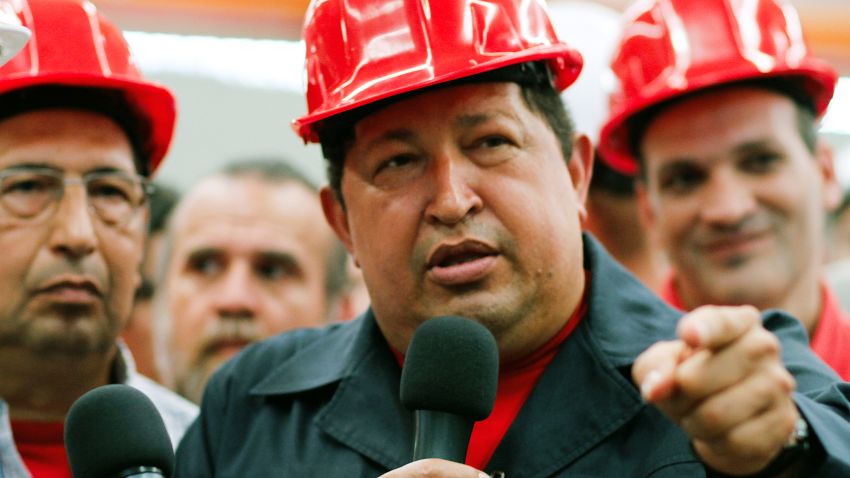 	Handout picture released by the Venezuelan presidency press office showing Venezuelan President Hugo Chavez (R) during an inspection at the Santa Ines agroindustrial complex, in Barinas, on February 21, 2012. Venezuelan President Hugo Chavez announced on Tuesday that in the coming days should be operated to remove a "lesion" in the same place where he was removed a cancerous tumor that was detected in 2011 during some tests in Cuba, but denied to have metastases. AFP PHOTO/PRESIDENCIA RESTRICTED TO EDITORIAL USE - MANDATORY CREDIT "AFP PHOTO/PRESIDENCIA" - NO MARKETING NO ADVERTISING CAMPAIGNS - DISTRIBUTED AS A SERVICE TO CLIENTS (Photo credit should read PRESIDENCIA/AFP/Getty Images)