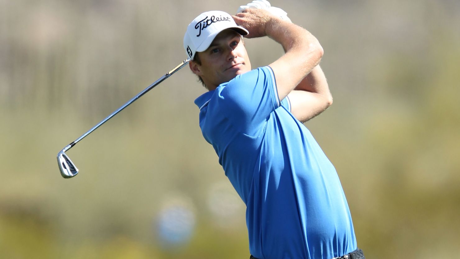Nick Watney plays an iron-shot during his victory over Tiger Wood at the WGC Match Play Championship. 