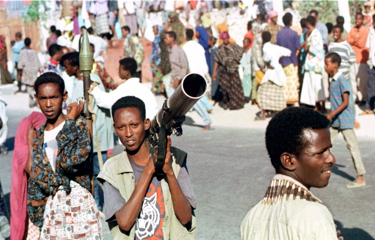The one thing more persistent than famine, however, has been the ever-present conflict between warlords and sectarian militia groups. In this photo from 1997, Somali gunmen hold rocket launchers on the streets of Mogadishu after local warload Ali Mahdi Mohamed accused his rival Hussein Aidid of setting up roadblocks in the streets of the capital. 