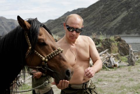 Vladamir Putin is a big animal lover -- or so the official photos of the Russian president petting tigers, playing with dolphins and, of course, pictured topless on this horse suggest.