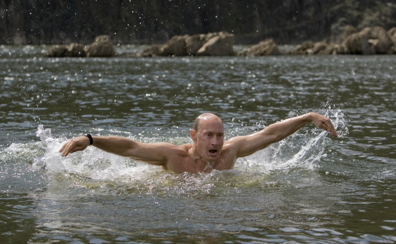 Putin swims the butterfly during his vacation outside the town of Kyzyl in southern Siberia on August 3, 2009.
