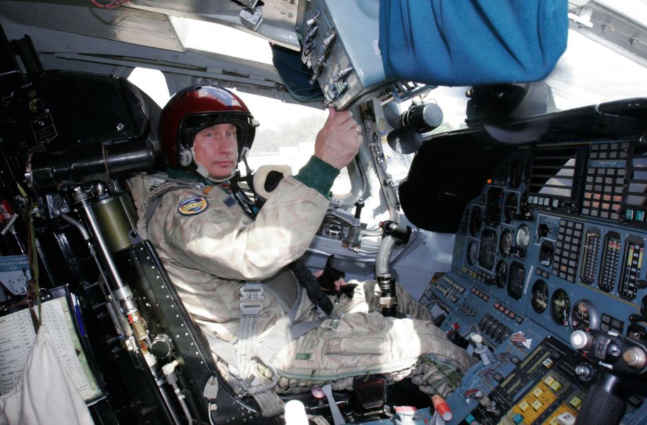 Putin in the cockpit of a Tupolev Tu-160 strategic bomber jet at a military airport on August 16, 2005, before his supersonic flight.