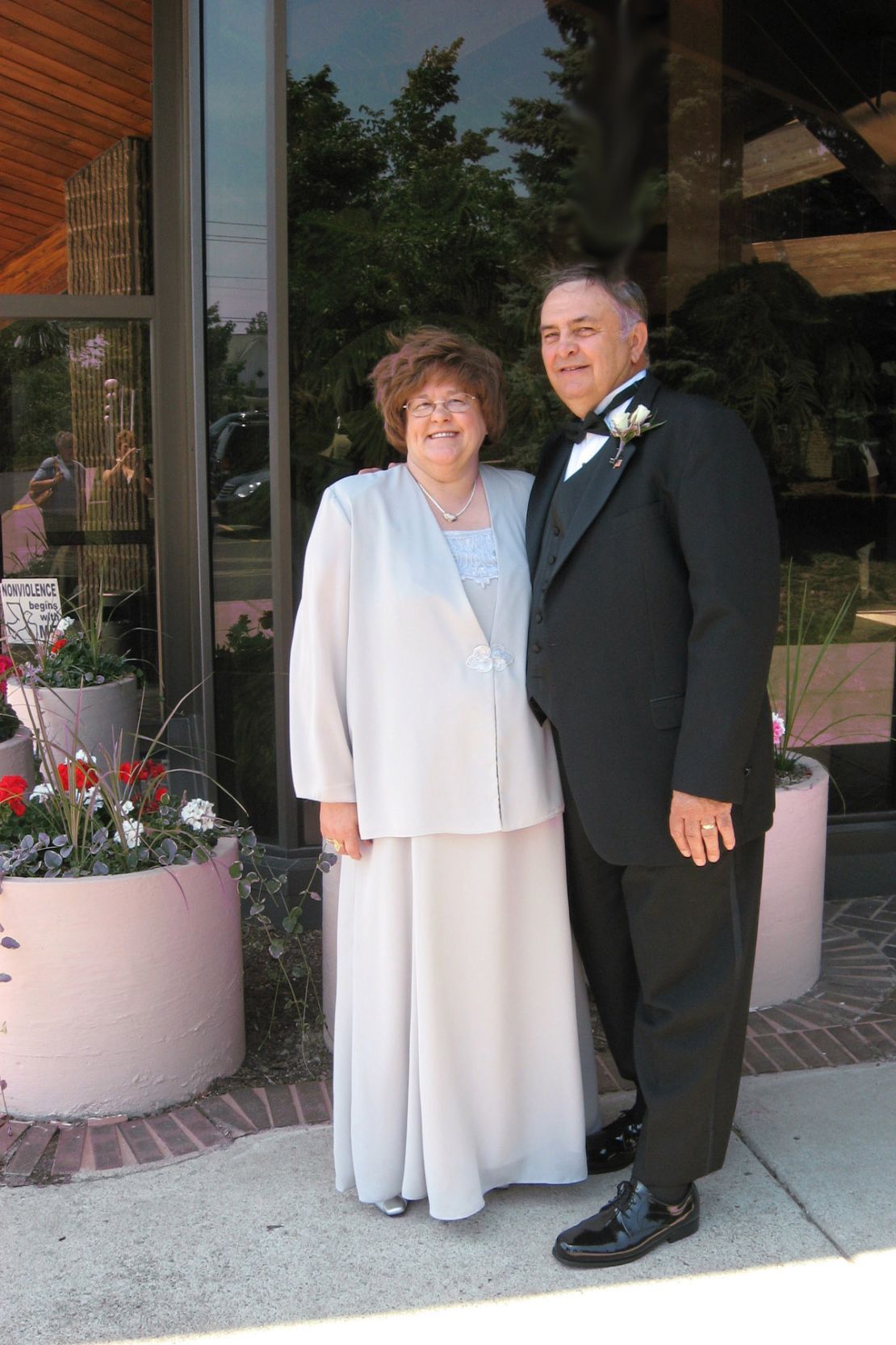 Kathy and Frank Korona pose for a photo at a July 2008 wedding reception. 