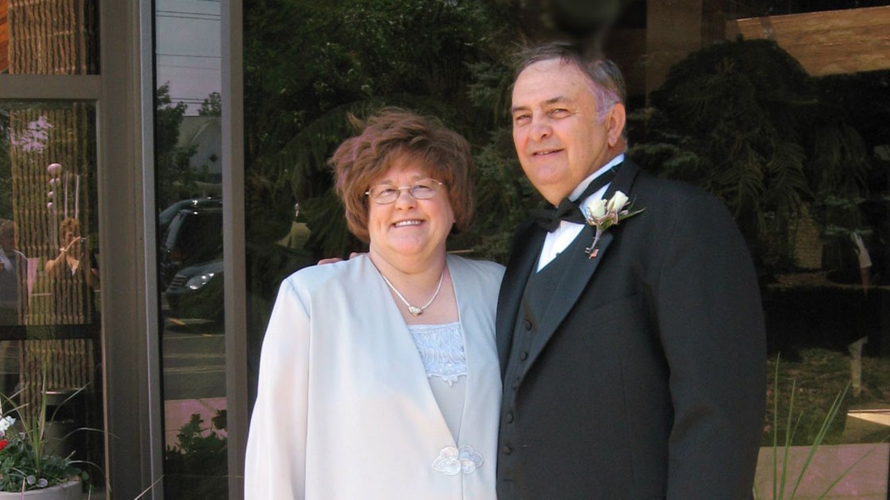 Kathy and Frank Korona pose for a photo at a July 2008 wedding reception. 