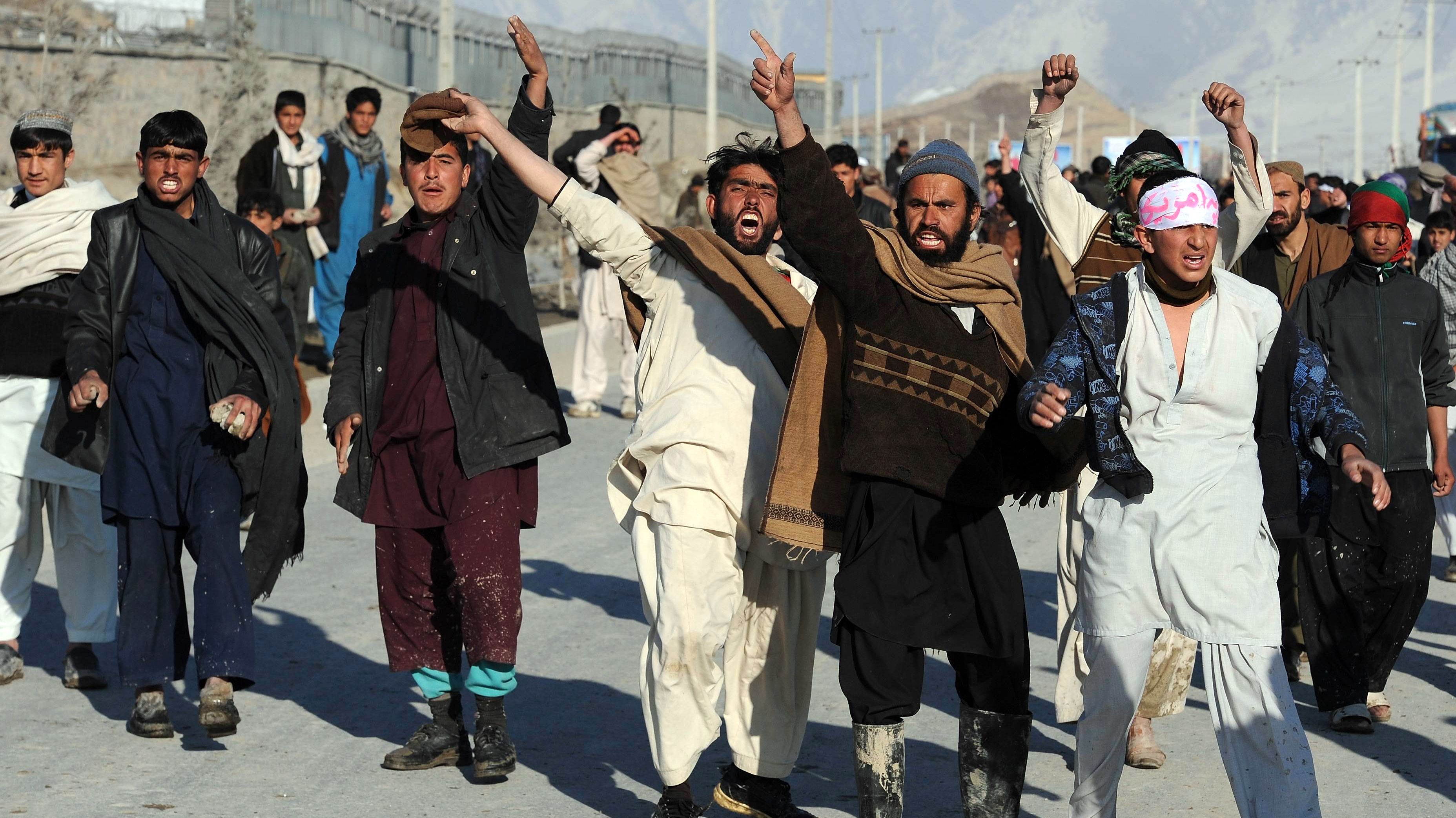 Afghan demonstrators shout anti-U.S. slogans during a recent protest in Kabul against the desecration of Qurans.
