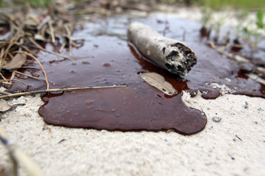 Thick oil is seen washed ashore from the Deepwater Horizon oil spill in the Gulf of Mexico on July 1, 2010 in Gulfport, Mississippi. Nanotechnology has the potential to tackle environmental disasters such as this much more effectively than traditional methods.
