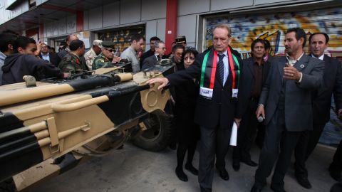 French defense minister Gerard Longuet, center, visits the War Museum on Sunday, in Misrata.