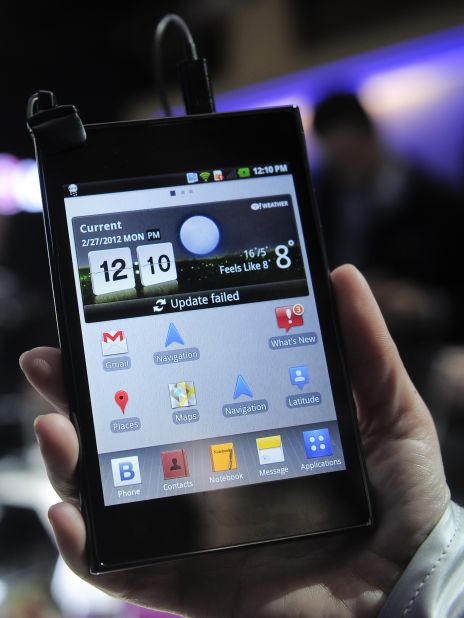 A hostess holds a LG Optimus Vu, which boasts one of the biggest screens seen on a smartphone.